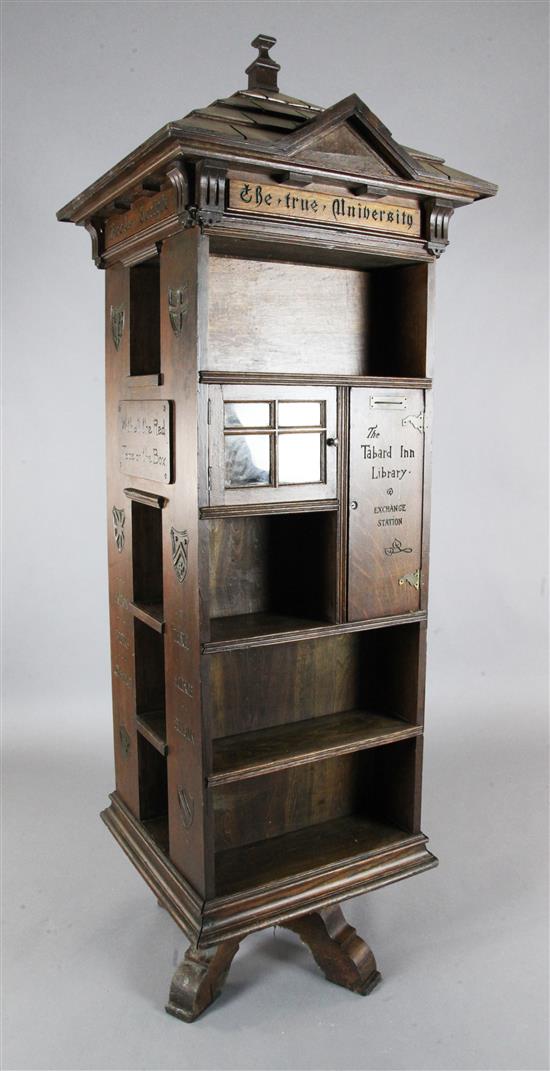 An early 20th century English Tabard Inn Library oak revolving bookcase W.2ft 3in. sq. H.6ft 6in.